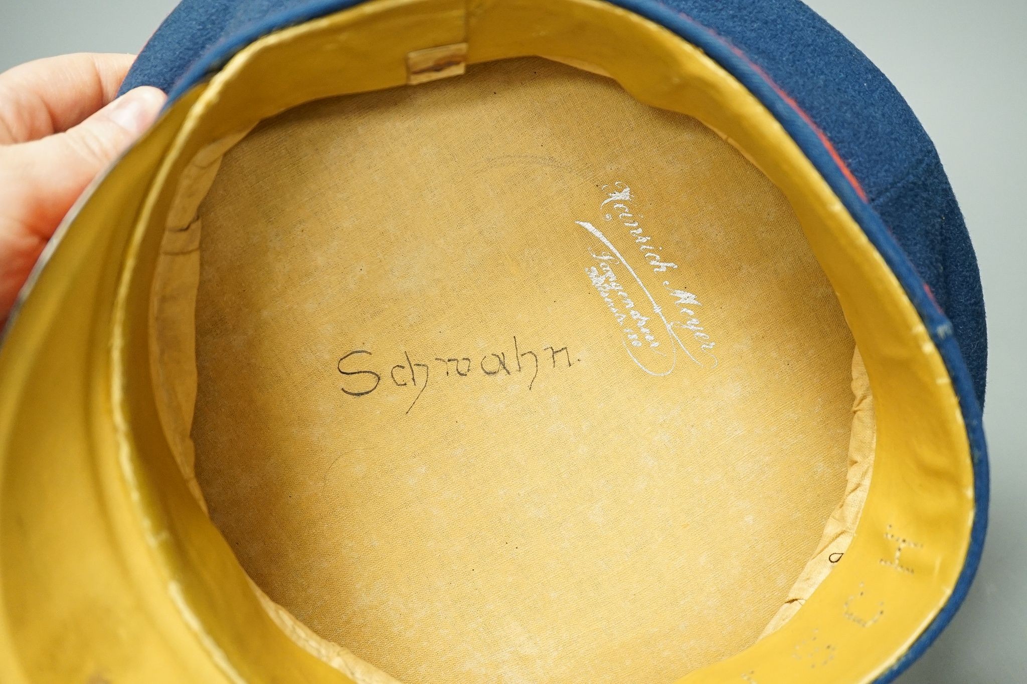 An Imperial German Prussian reservist peaked cap